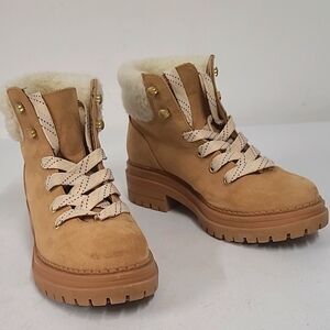 Super cute like new So faux seude boots. Maybe worn one or two times.